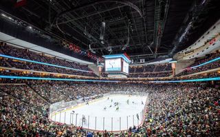 A full arena cheering on NHL's Minnesota Wild with Meyer Sound providing the audio.