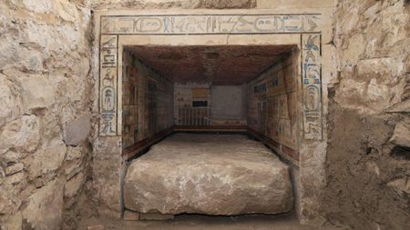 An Egyptian tomb with hieroglyphics on the walls