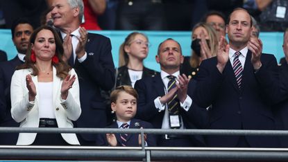 london, england july 11 catherine, duchess of cambridge, prince george of cambridge and prince william, duke of cambridge and president of the football association applaud during the uefa euro 2020 championship final between italy and england at wembley stadium on july 11, 2021 in london, england photo by eddie keogh the fathe fa via getty images