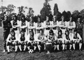 Ajax players pose for a team photograph with the European Cup in 1973.