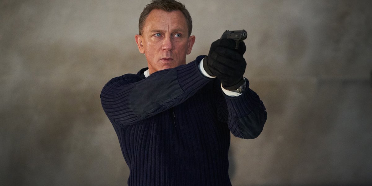 James Bond holding a gun in No Time To Die