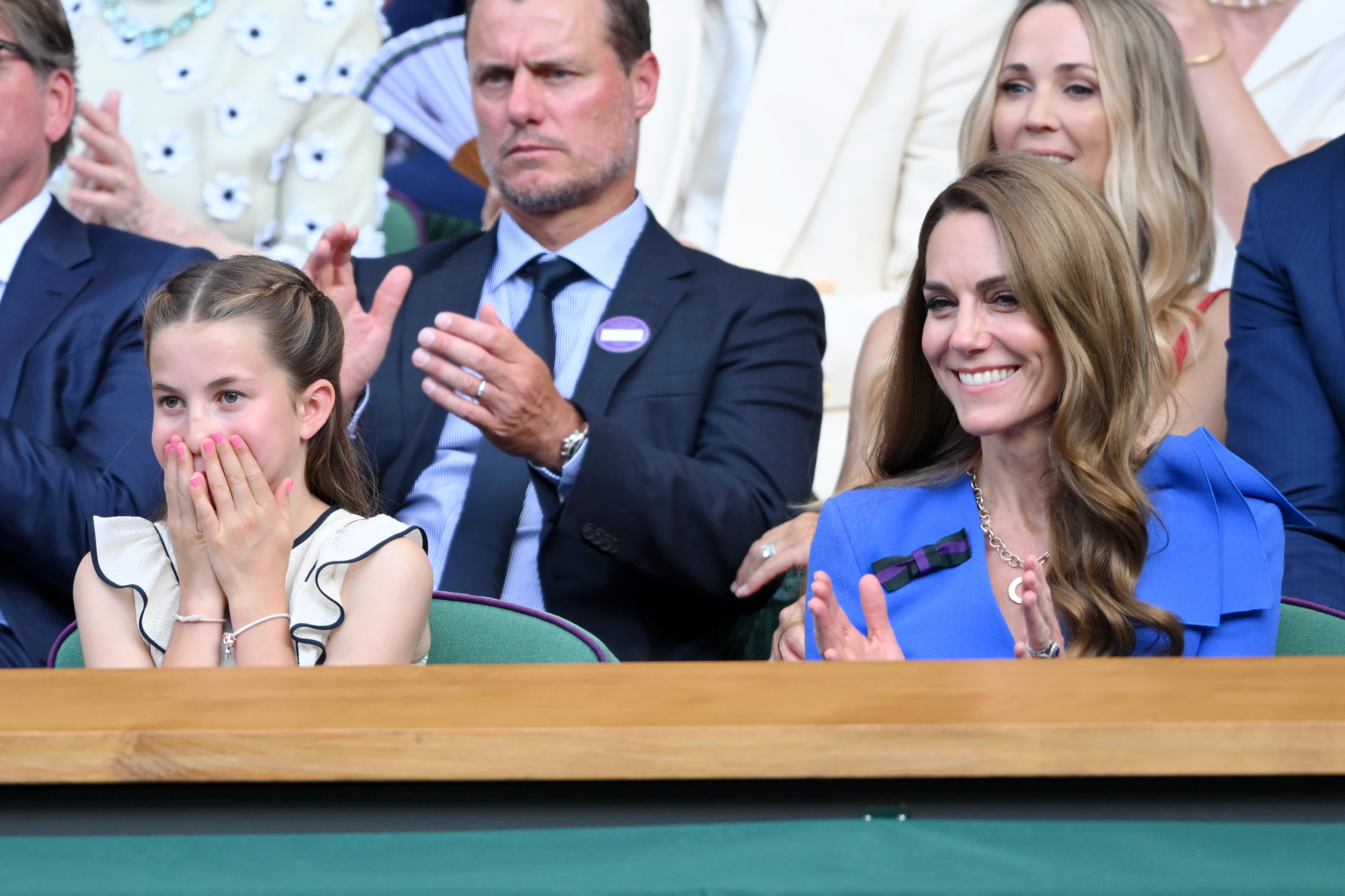 Princess Charlotte at Wimbledon making funny facial expressions