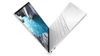 Dell XPS 13 (Late 2020) with the screen open and at an angle showing how thin the laptop is