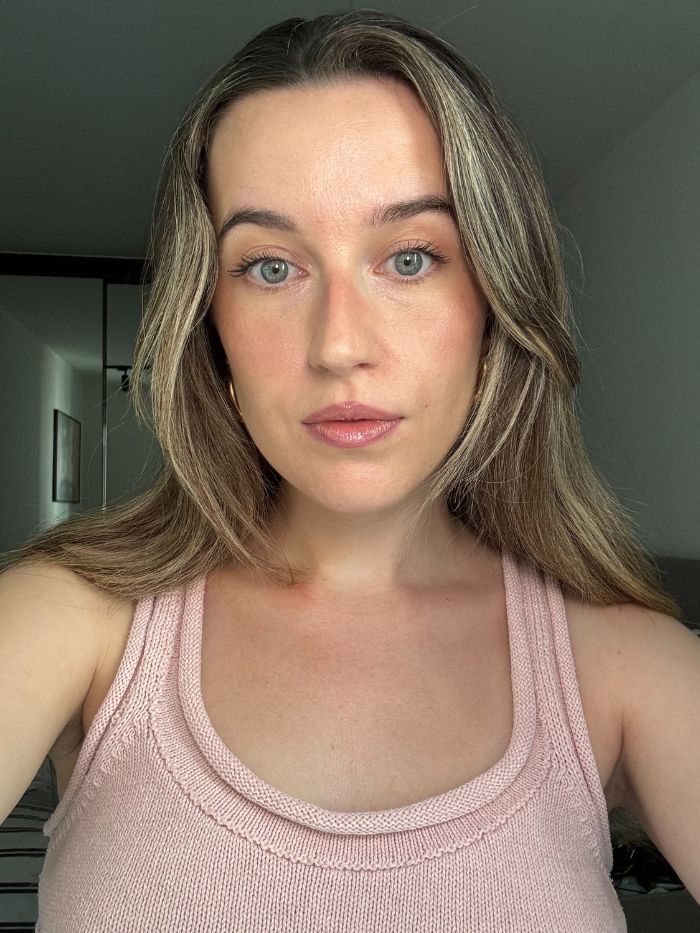 Deputy beauty editor Grace Lindsay wearing makeup after testing the Drunk Elephant T.L.C. Framboos Night Serum