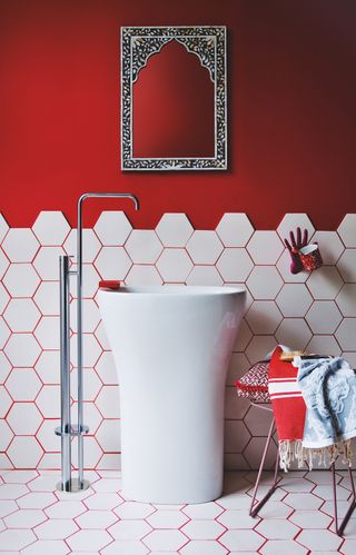 red grout around white hexagonal tiles