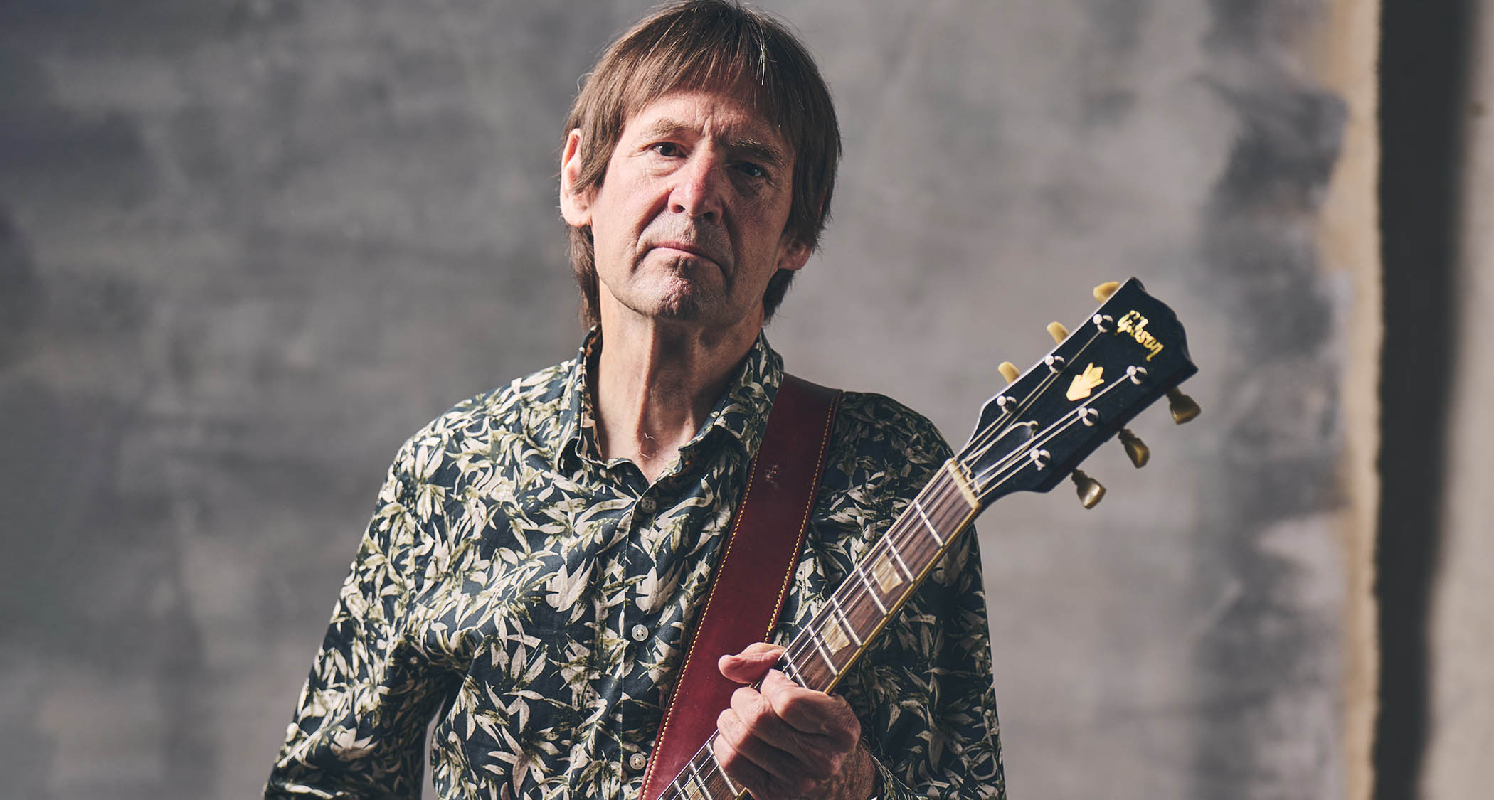 Dave Gregory is pictured with his Gibson SG
