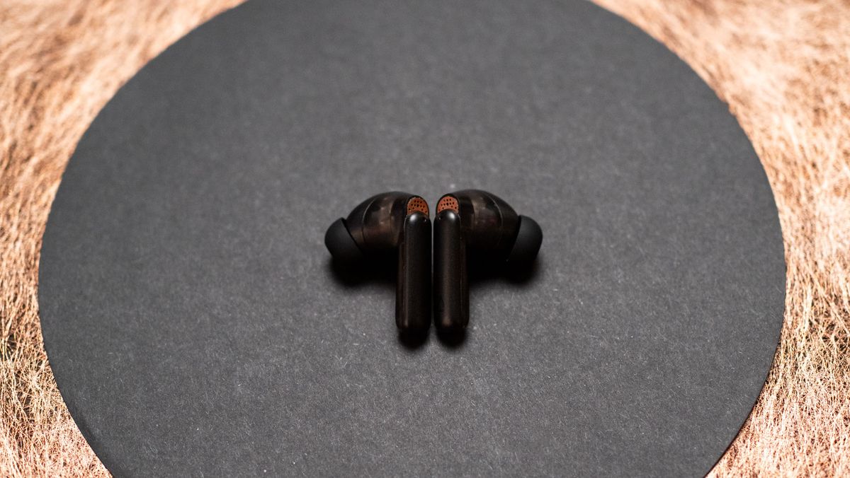 Creative Aurvana Ace 2 earbuds next to each other