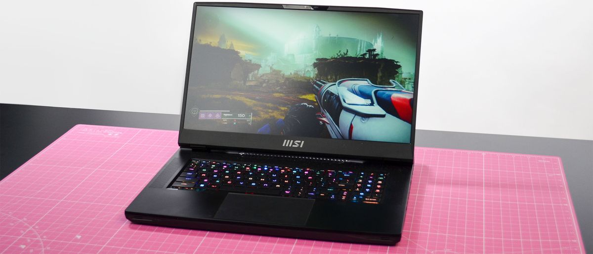 An MSI GT77 Titan on a pink desktop mat