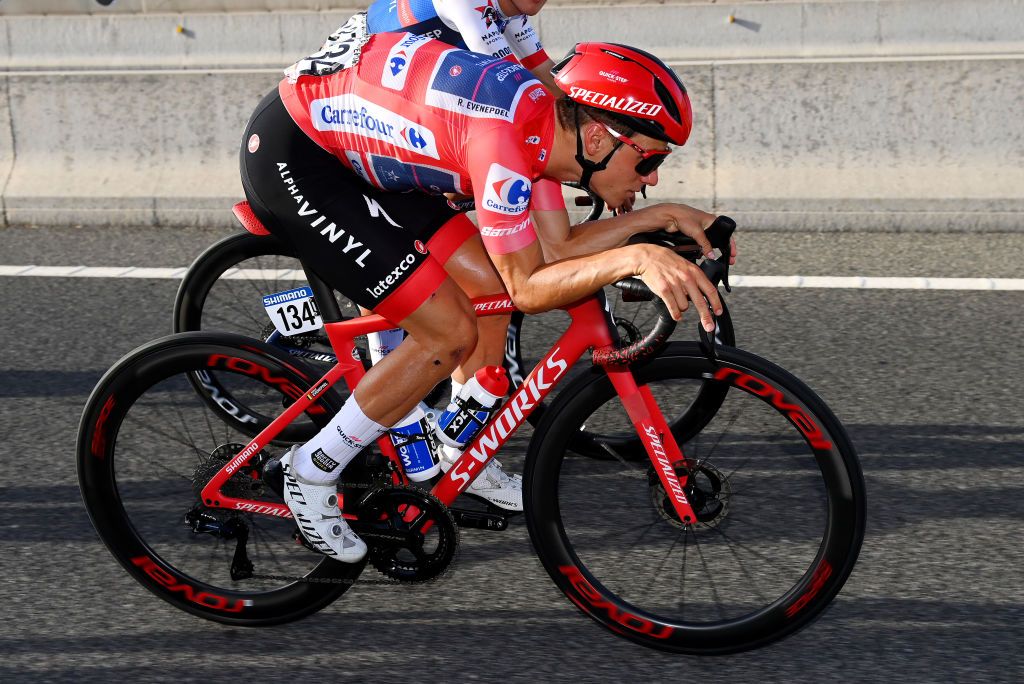 MADRID SPAIN SEPTEMBER 11 Remco Evenepoel of Belgium and Team QuickStep Alpha Vinyl Red Leader Jersey competes during the 77th Tour of Spain 2022 Stage 21 a 967km stage from Las Rozas to Madrid LaVuelta22 WorldTour on September 11 2022 in Madrid Spain Photo by Tim de WaeleGetty Images