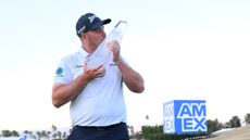 Sepp Straka kisses The American Express trophy after winning in 2025