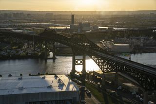Aerial photo of the Pulaski Skyway bridge connecting Newark and Jersey City at sunset.
