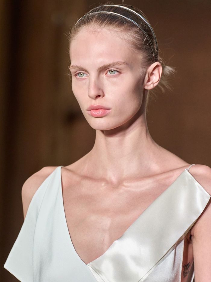 A close-up of a model on the runway at the Calvin Klein S/S 27 fashion show