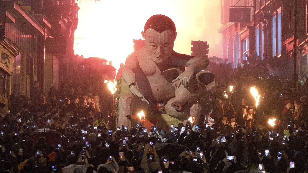 The annual parade featured effigies of David Cameron and a pig - a reference to Lord Ashcroft's unseemly allegations