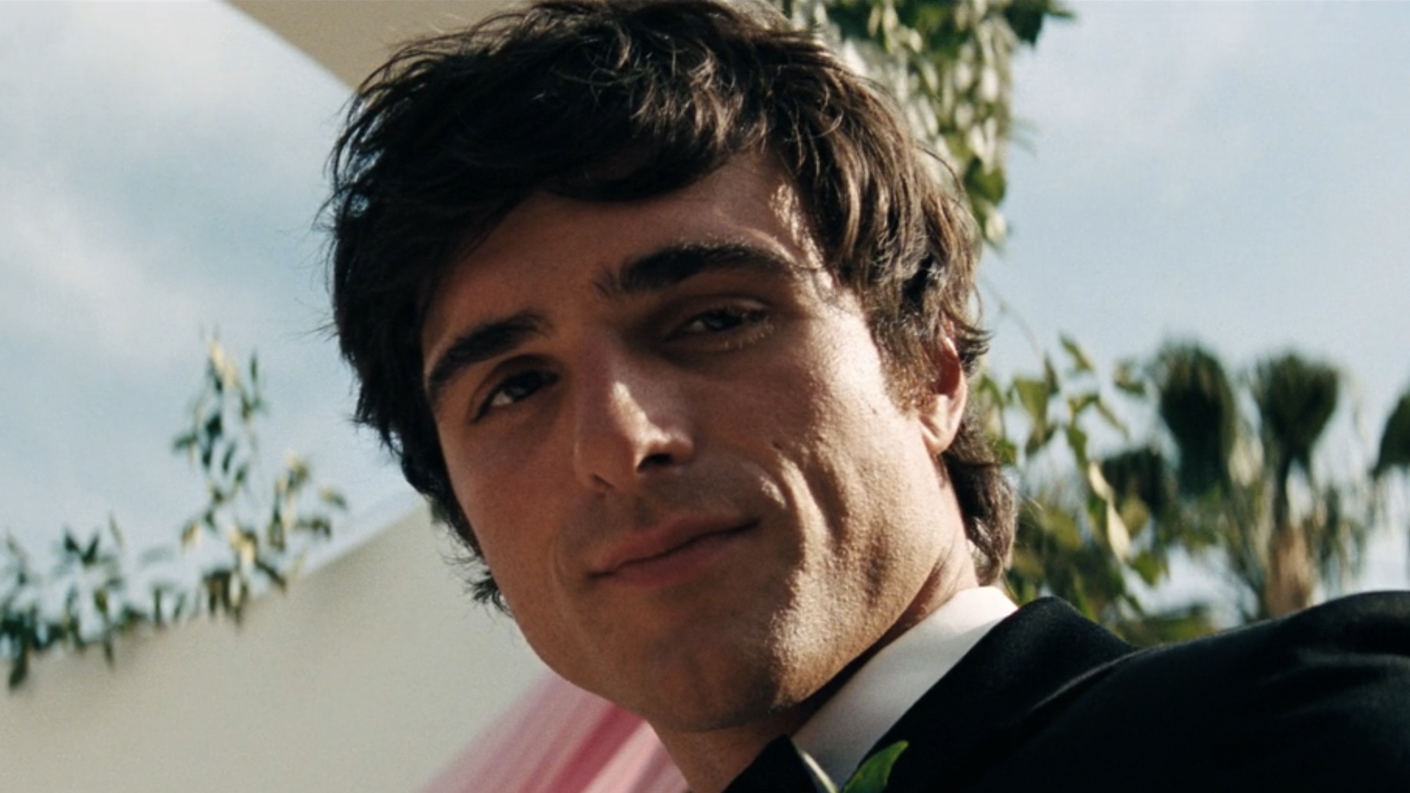 Nate Jacobs looking down at Cassie on their wedding in Euphoria.