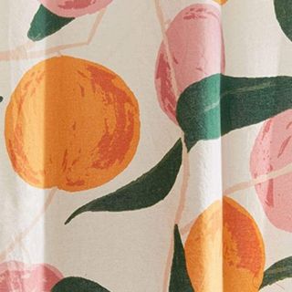 A peach patterned shower curtain