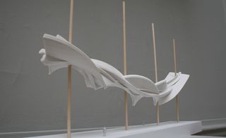 A scaled model of the final sculpture in white