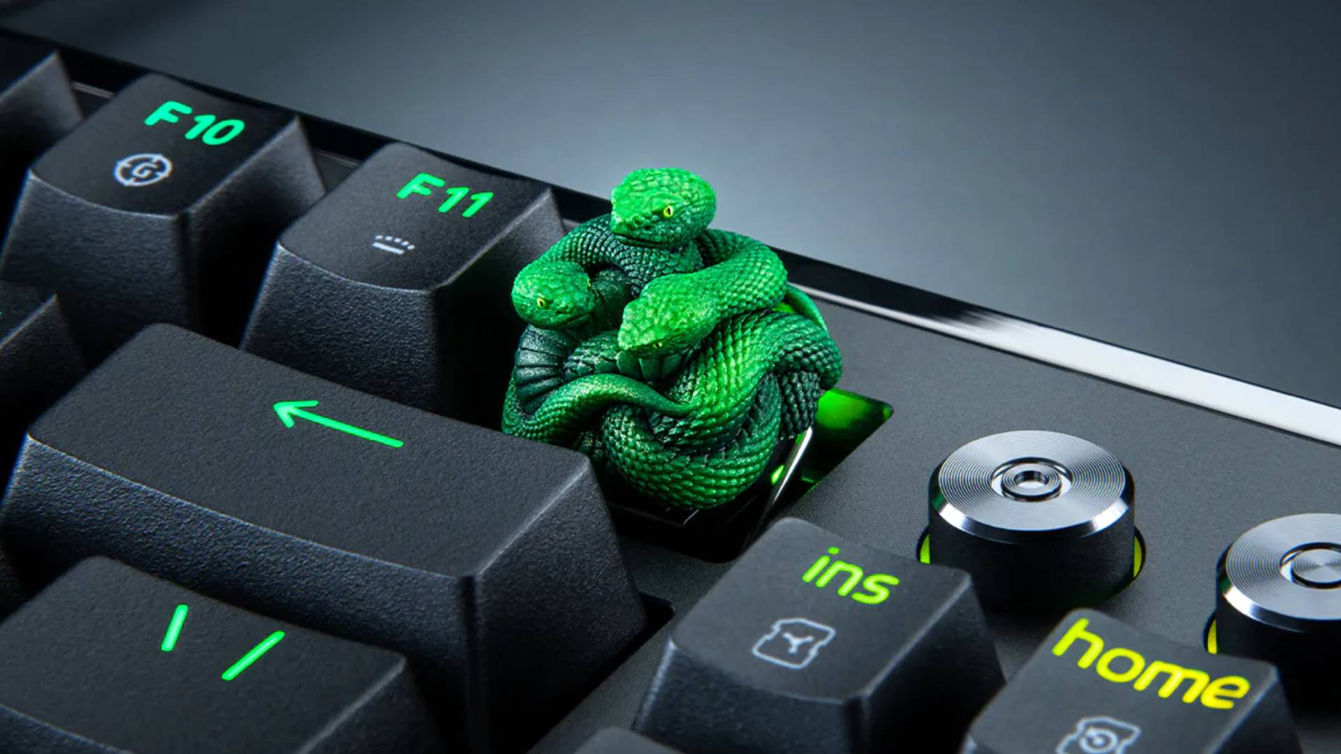 Image of the Razer Triple-Headed Snake Edition keycap attached to a keyboard.