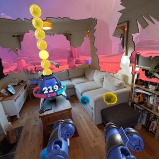 First Encounters VR pass through showing yellow topped spaceship on table