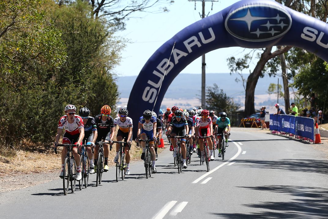 Passing under the KOM banner