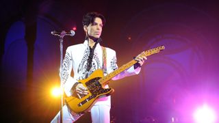 US singer Prince performs on October 11, 2009 at the Grand Palais in Paris. Prince has decided to give two extra concerts at the Grand Palais titled "All Day/All Night" after he discovered the exhibition hall during Karl Lagerfeld's Chanel fashion show