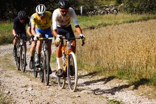 Jasper Ockeloen (Trek) leads Piotr Havik (Westland Wil Vooiruit) in a group of three during Gravel Grit 'n Grind, the Swedish round of the Gravel World Series in Sweden