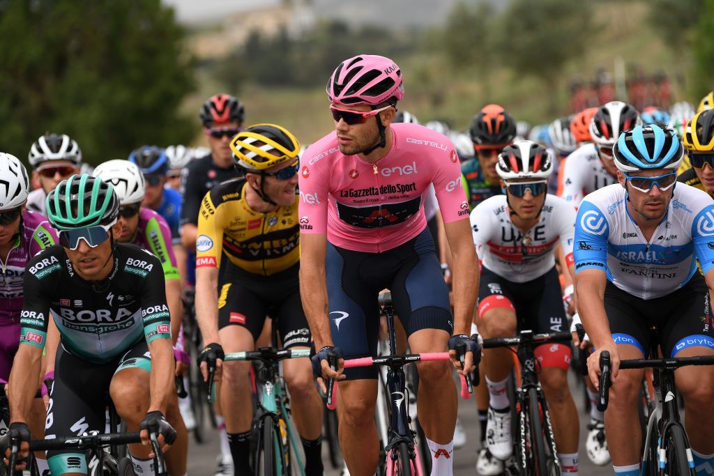 ETNALINGUAGLOSSA ITALY OCTOBER 05 Filippo Ganna of Italy and Team INEOS Grenadiers Pink Leader Jersey Rudy Barbier of France and Team Israel StartUp Nation during the 103rd Giro dItalia 2020 Stage Three a 150km stage from Enna to Etna Linguaglossa Piano Provenzana 1793m girodiitalia Giro on October 05 2020 in Linguaglossa Italy Photo by Tim de WaeleGetty Images