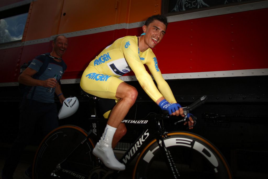 Julian Alaphilippe looking happy after keeping yellow