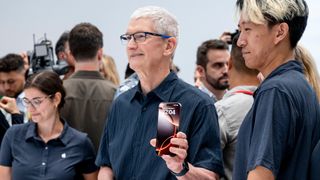 Tim Cook with iPhone 16 Pro Max at iPhone 2024 launch event