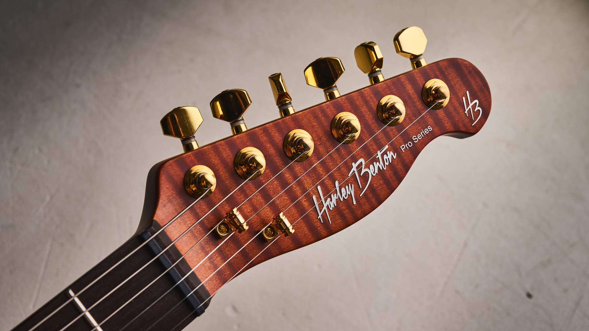 Harley Benton Fusion-T II HH RW HT in Purple Metallic finish with gold hardware. Shot on white surface.