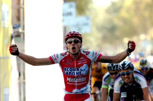 Fabio Taborre puts up his arms in celebration