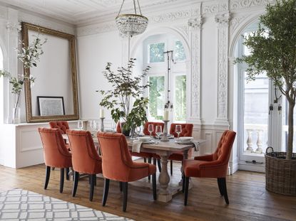 How big should a dining table be compared to the room?