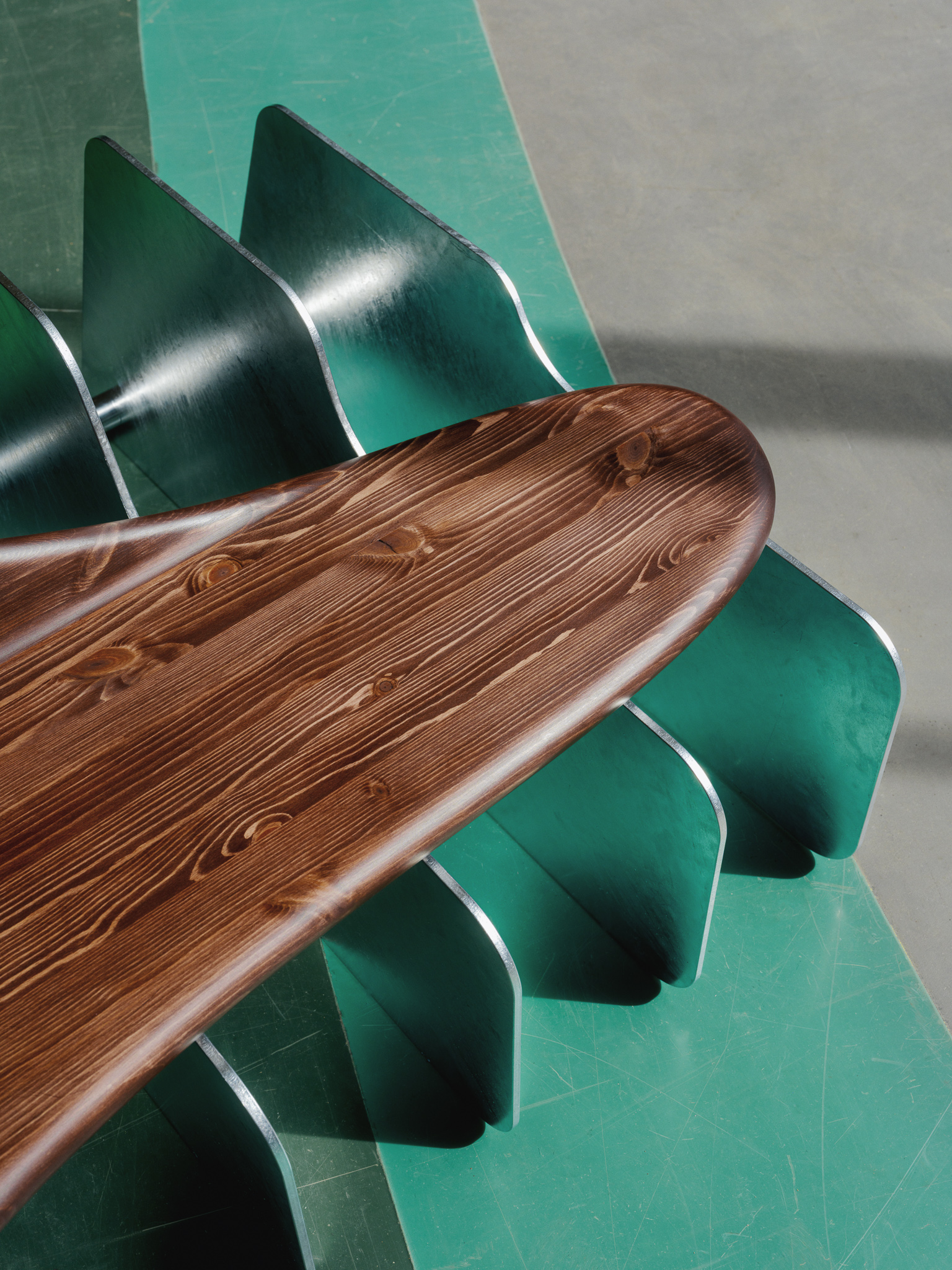 galvanised steel and timber bench on coloured striped floor