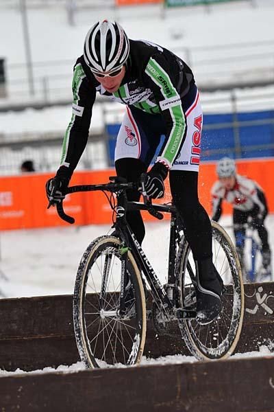 The US's Jeremy Powers puts his bunny-hopping skills to use on the barriers.