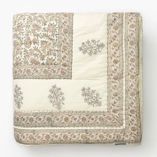 neutral patterned quilt