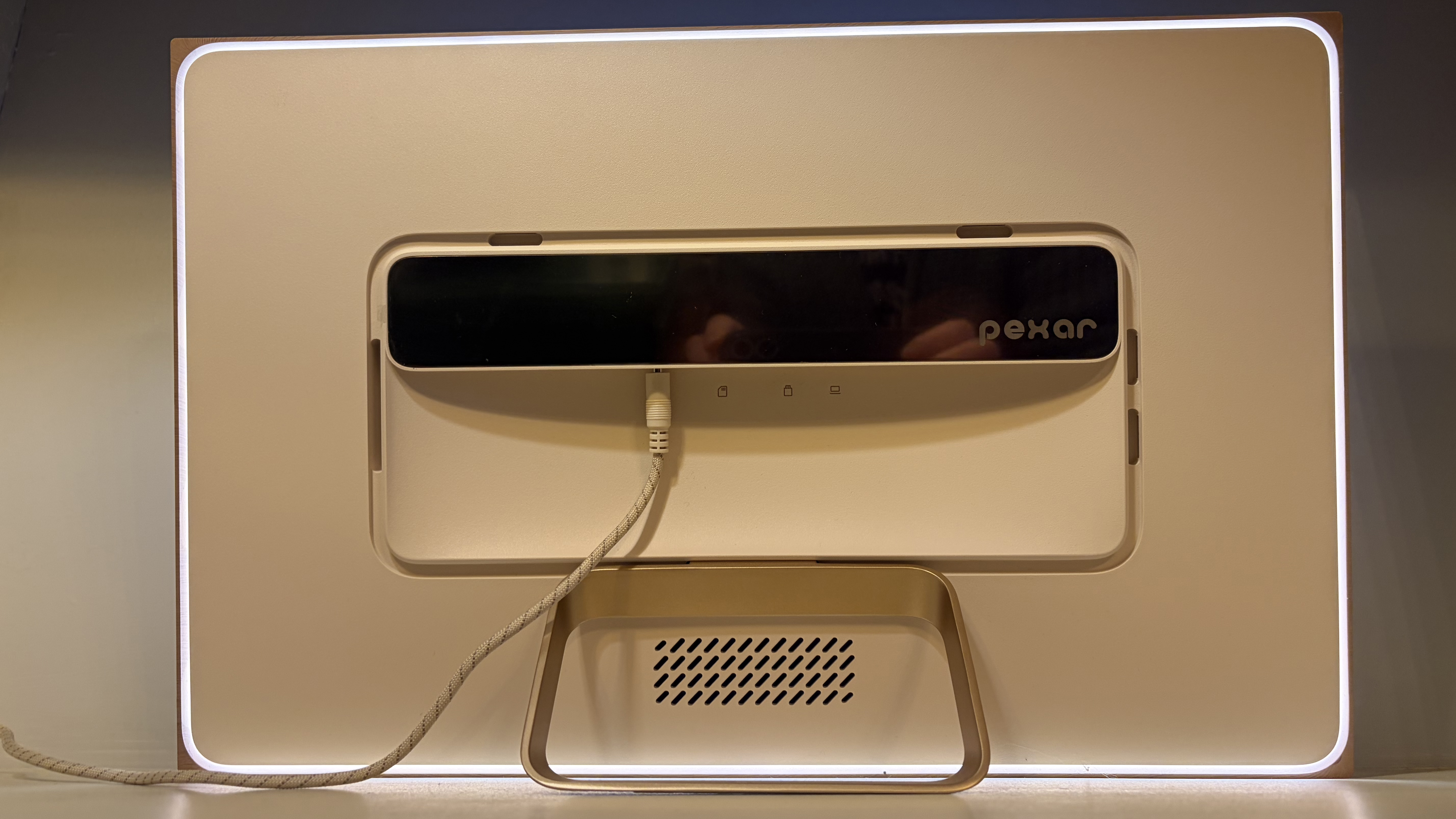 Pexar Starlight digital photo frame showing rear backlight