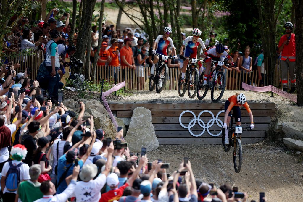 ELANCOURT FRANCE JULY 28 LR Laura Stigger of Team Austria and Puck Pieterse of Team Netherlands leads the peloton during the Womens CrossCountry Cycling Mountain Bike Gold Medal race on day two of the Olympic Games Paris 2024 at Elancourt Hill on July 28 2024 in Elancourt France Photo by Jared C TiltonGetty Images