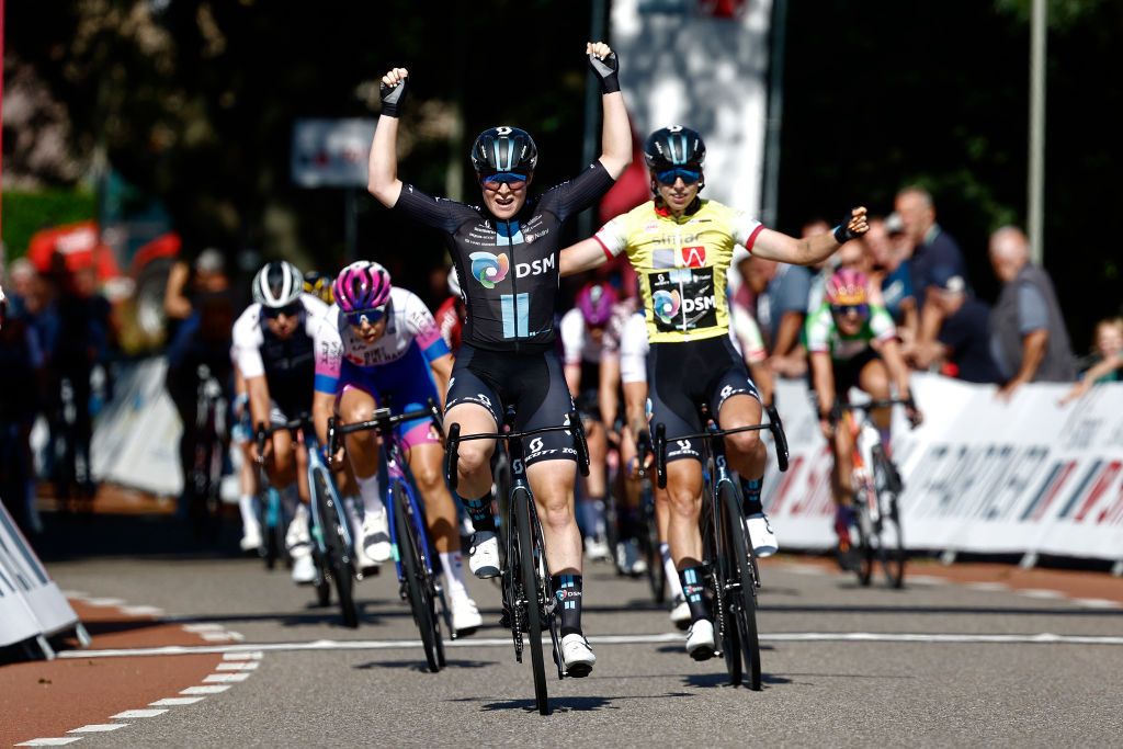 GENNEP NETHERLANDS SEPTEMBER 01 Charlotte Kool of Netherlands and Team DSM celebrates at finish line as stage winner Georgia Baker of Australia and Team BikeExchange Jayco and Lorena Wiebes of Netherlands and Team DSM Yellow leader jersey during the 25th Simac Ladies Tour 2022 Stage 3 a 1391km stage from Gennep to Gennep SLT2022 UCIWWT on September 01 2022 in Gennep Netherlands Photo by Bas CzerwinskiGetty Images
