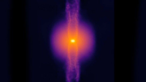 A rotating core of gas collapses, forming a star which expels two enormous jets of gas.