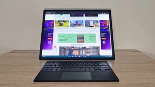 Asus Zenbook 17 Fold OLED review: 17-inch convertible laptop on a wooden desk
