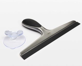 A stainless steel and silicone shower squeegee