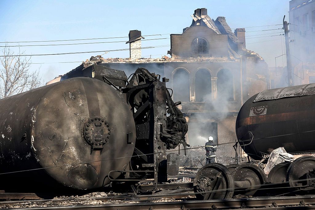 A firefighter works on the site where train transporting gas derailed in the northeastern Bulgarian village of Hitrino on December 10, 2016