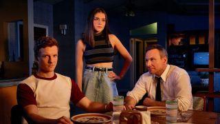 Promotional image for Dexter: Original Sin showing actors Patrick Gibson, Molly Brown and Christian Slater surrounding a dining table