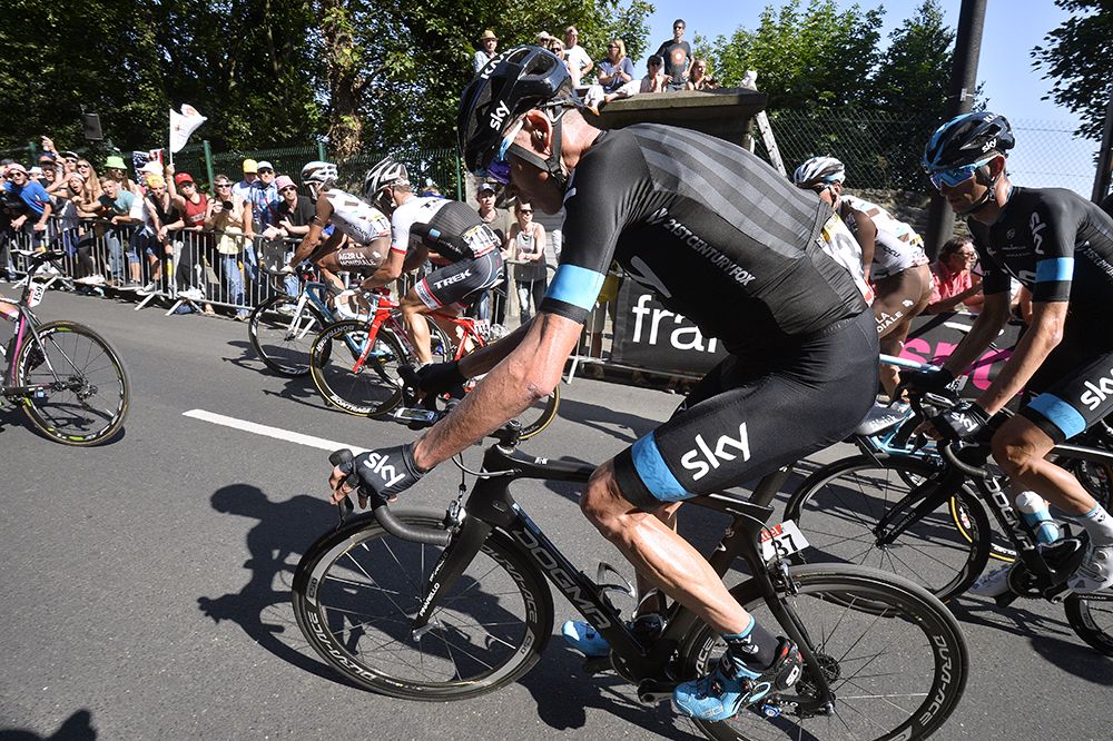 Chris Froome (Sky) avoided the crash but needed a wheel change