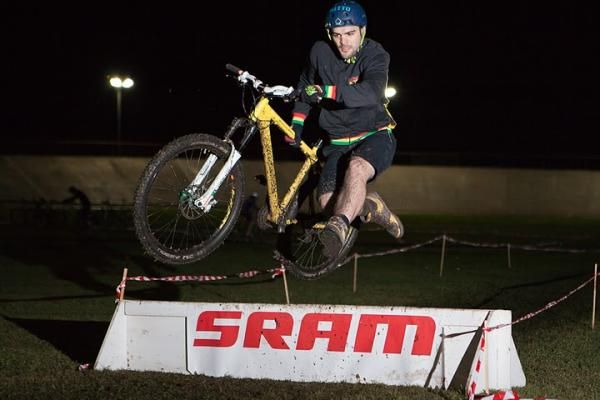 Brent May jumps over the barrier