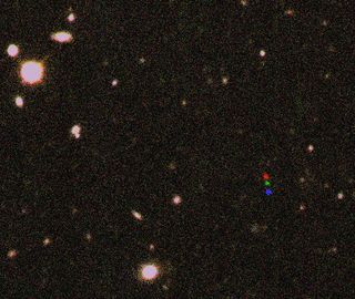 The discovery images of 2012 VP113 combined into one frame. The red, green and blue dots show its path across the sky.