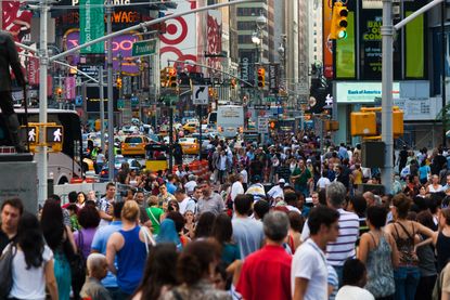 a crowded New York City street near Broadway