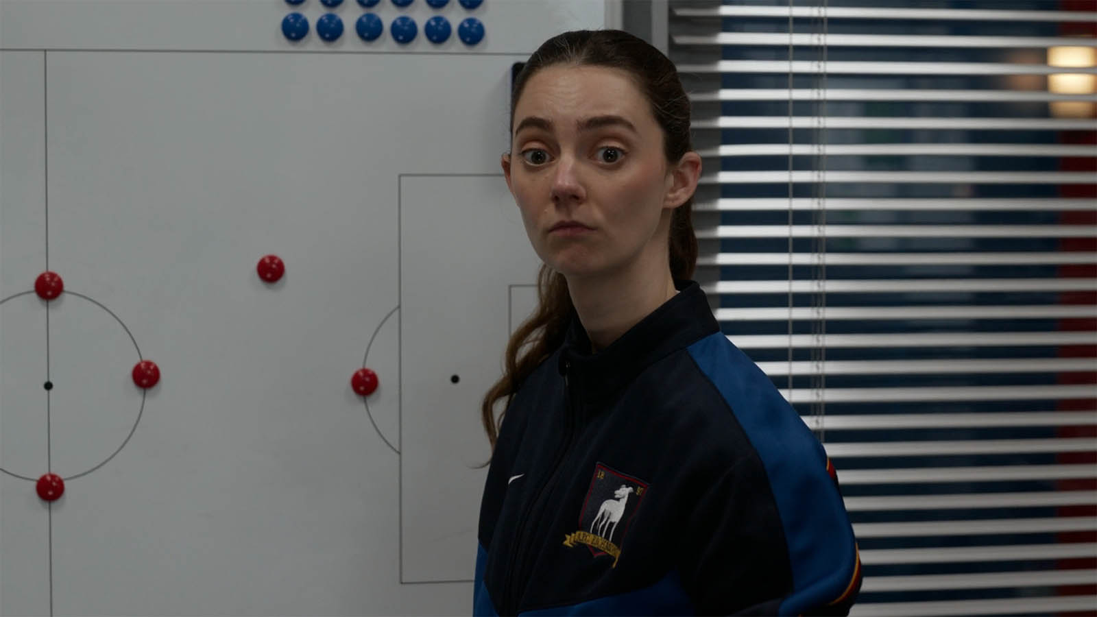 Alice standing next to a tactics board in Ted Lasso season 4 episode 9