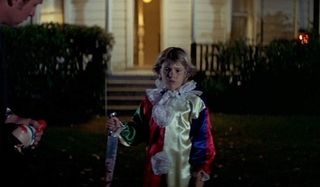Halloween young Michael caught with a bloody knife in a clown costume