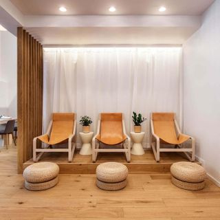 Chairs and footstools inside Sundays nail salon in New York