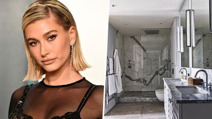 hailey bieber next to dark marble bathroom